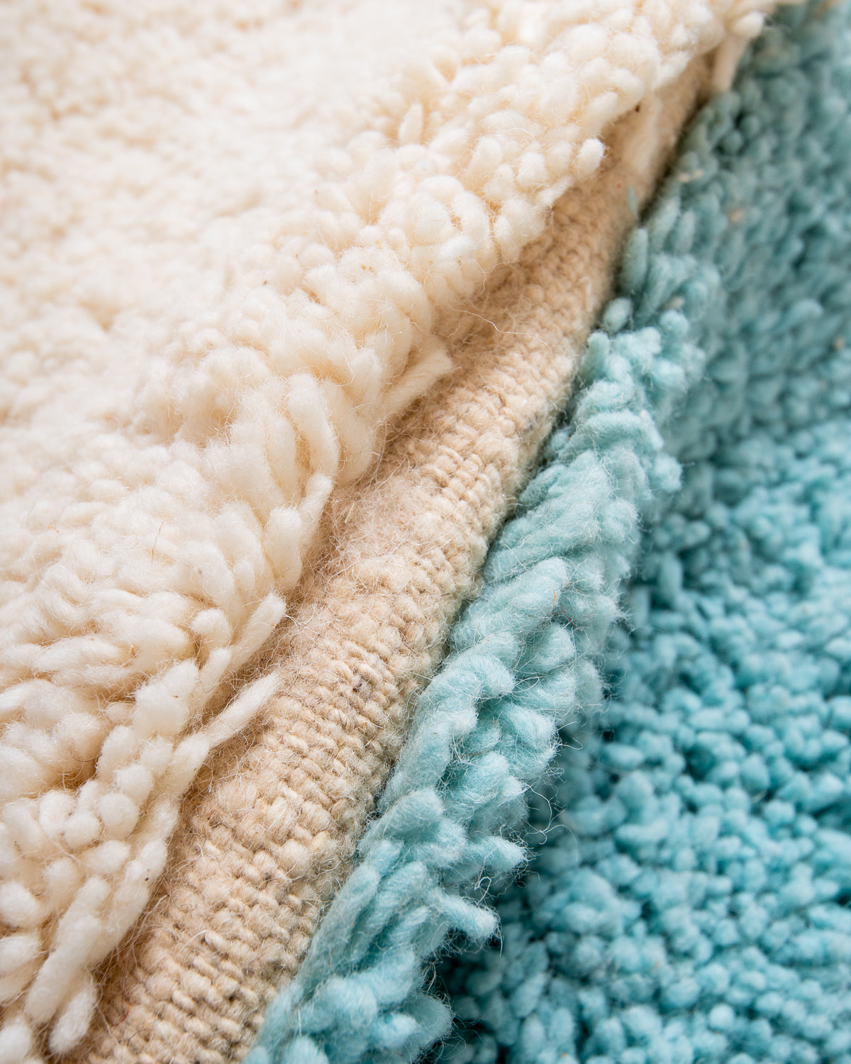 Modern, designer, handcrafted Berber rug from Morocco. Beniourain carpet with beautiful colours and patterns and fluffy wool texture.